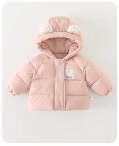 Detailed close-up of pink baby winter coat featuring 3D bunny ears with floral lining