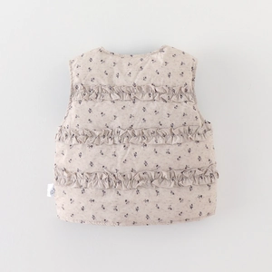 Quilted floral puffer vest for girls with ruffle back detail and warm filling