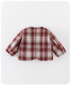Close-up of thick plaid wool jacket for baby girls with red and white Scottish pattern