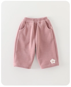 Detail of pink toddler waffle knit pants featuring elastic waist and flower embroidery