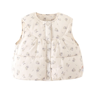 Gilet matelassé enfant crème avec motif floral violet et boutons de fermeture