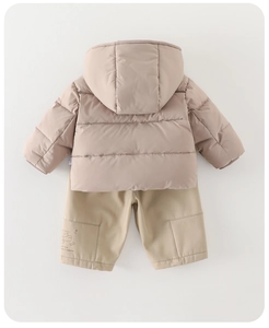 Detail view of baby winter set featuring warm quilted jacket and embroidered trousers
