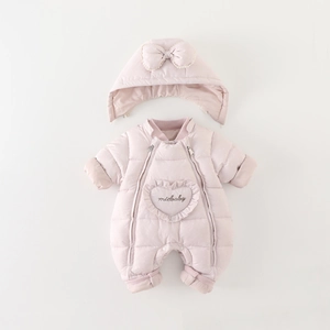 Pink quilted baby romper with matching bow hat and heart-shaped pocket embroidery