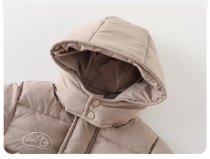 Close-up of baby winter coat showing hooded design, button closure, and fine embroidery