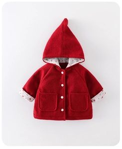 Detail of red hooded wool coat for baby girls with floral lining and button closure