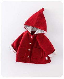 Detail of red hooded wool coat for baby girls with floral lining and white buttons