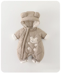 Detail of khaki quilted baby romper featuring bear ear hood and cute bear embroidery