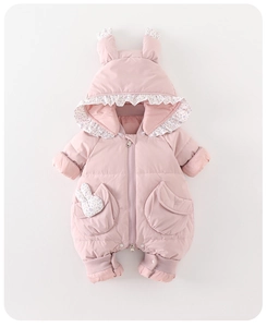 Detail view of pink baby winter romper featuring cute bunny ears and floral trim ruffles