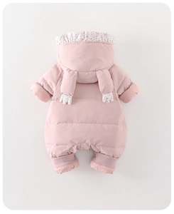 Detail of pink baby snowsuit with floral hood lining and ribbed cuffs for warmth