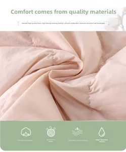 Détail du tissu rose matelassé pour gilet bébé montrant la texture douce et respirante