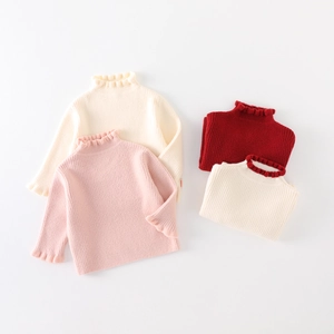 Mädchen-Rollkragenpullover mit Rüschensaum in Creme, Rosa und dunklem Rot