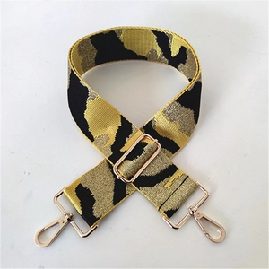 Adjustable camouflage bag strap with gold metal swivel hooks and buckles for handbags