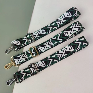 Ethnic wide woven shoulder straps with geometric patterns and multi-finish metal clips
