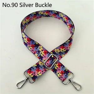 Detail view of ethnic floral replacement strap with silver metal buckles and adjusters