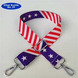Detail of adjustable star and stripe pattern shoulder strap with silver metal buckles