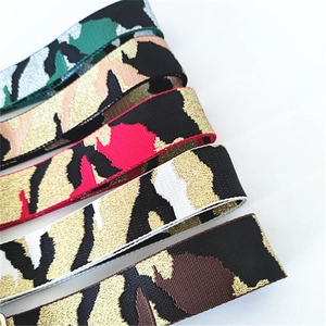 Close-up of camouflage wide bag straps with metallic weave in multiple color options