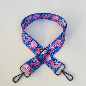 Detail of blue floral bag strap with pink flowers and No. 39 gunmetal swivel hooks