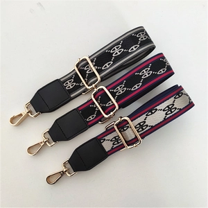 Adjustable wide jacquard bag straps with striped geometric patterns and gold clips