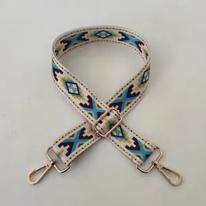 Close-up of ethnic style replacement shoulder strap with gold-tone zinc alloy buckle