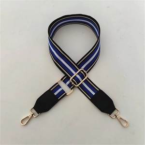 Adjustable wide striped purse strap with premium black leather ends and gold metal buckles