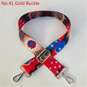 Close-up of bohemian style replacement bag strap with colorful patterns and gold hardware