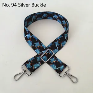 Adjustable wide replacement bag strap featuring blue and orange ethnic patterns with silver buckles
