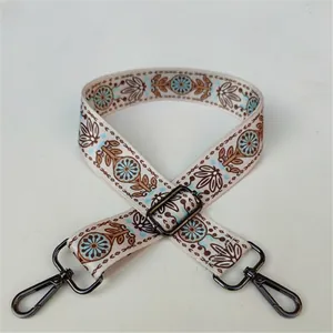 Ethnic style floral strap with gunmetal swivel clasps and adjustable slider buckle