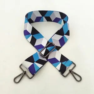 Macro shot of 02 gunmetal clasp on geometric pattern wide adjustable bag strap