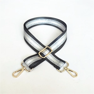 Adjustable striped woven shoulder strap with silver glitter and gold metal lobster clasps