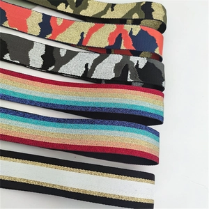 Detail view of colorful ethnic style elastic shoulder straps with various pattern weaves