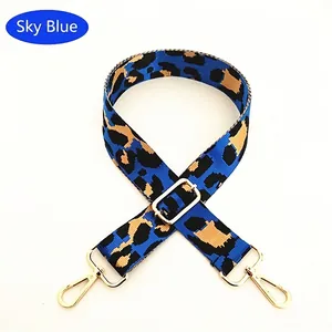 Adjustable wide replacement shoulder strap with sky blue leopard print and gold metal buckles