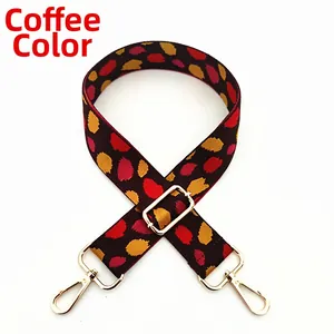 Detail of adjustable coffee leopard print wide strap with gold metal lobster clasps