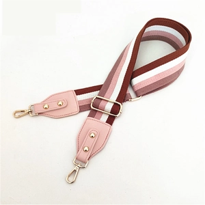 Adjustable colorful wide woven shoulder strap with pink leather ends and gold metal hooks