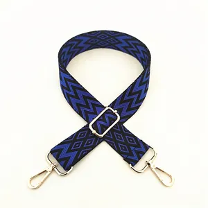 Adjustable woven replacement bag strap with blue and black geometric wave patterns