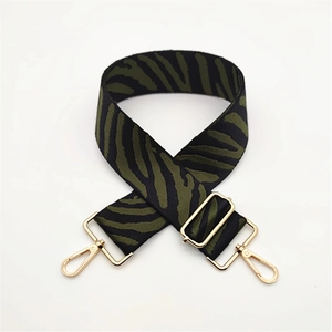 Adjustable wide replacement strap with green zebra pattern and gold metal hardware