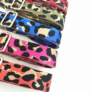 Detail view of multi-color leopard print straps with golden adjustable metal buckles