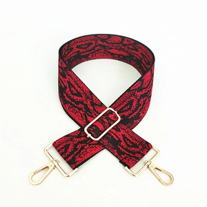 Bandoulière large réglable avec motif serpent rouge et noir et boucles dorées métalliques