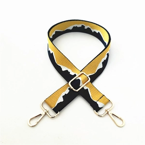 Adjustable wide replacement bag strap with yellow black and white geometric wave pattern