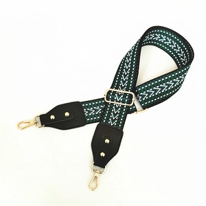 Adjustable wide replacement bag strap with green and white geometric chevron pattern