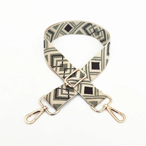 Adjustable geometric ethnic style shoulder strap with gold metal hardware for handbags