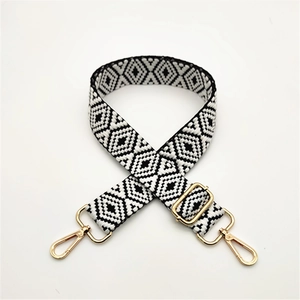 Adjustable wide woven guitar strap for handbags with geometric black and white pattern