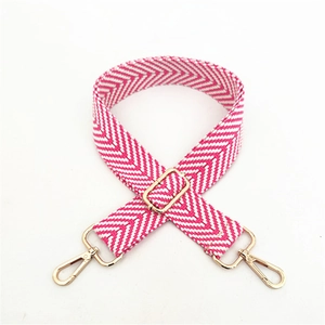 Adjustable thickened shoulder strap with pink and white chevron weave and gold lobster clasps
