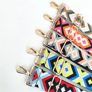 Detailed view of five colorful ethnic geometric embroidered adjustable shoulder straps