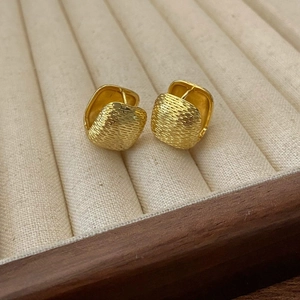 Textured golden square huggie earrings with a unique woven metal finish for women