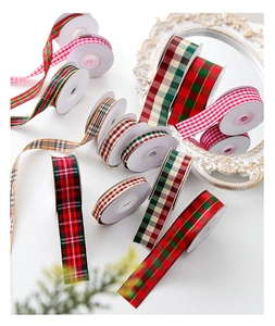 Assorted Christmas plaid ribbon rolls for DIY gift wrapping and festive decor