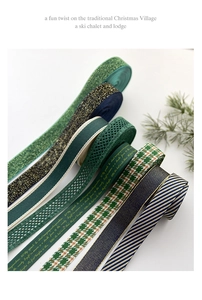 Close-up of assorted Christmas ribbons with gold foil patterns and festive textures