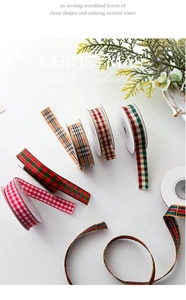 Detail view of assorted Christmas plaid ribbons for festive gift wrapping and DIY crafts