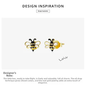 Detailed close-up showing enamel bee stud earrings with gold plating and drip oil craft
