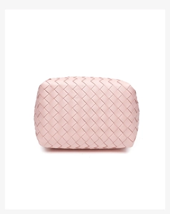 Detailed close-up showing intricate pink leather weaving texture on this minimalist tote