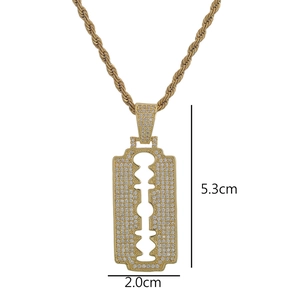 Detailed macro view of iced out razor blade pendant necklace showing 5.3cm length
